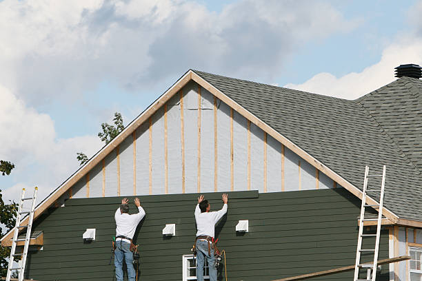 Professional Emergency Siding Repair technician working in Carrollton, OH